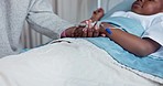 Hospital, bed and parent holding hands with child for comfort, compassion and care with iv drip. Healthcare, family and support, love and trust for kid for medical service, wellness and treatment