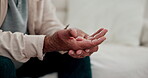 Massage fingers, pain and arthritis, sick or disease in home living room closeup. Touch hands, inflammation and man with injury, muscle fibromyalgia and rheumatoid, health problem and osteoporosis