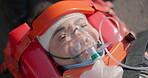 Oxygen mask, first aid and woman breathing after accident, injury and top view in street. Ventilation, medical emergency and sick person in pain on stretcher at road for health, healing or anesthesia