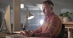 Business, night and man with a smartphone, computer and typing with a deadline, connection and search internet. Person, consultant and employee with a pc, evening and cellphone with a digital app