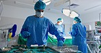 Nurse with tools, surgery and team in operating room at emergency healthcare clinic with medicine. Health, doctor or surgeon cleaning metal equipment in hospital theater for wellness, safety and help