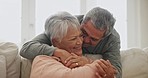 Old people, sofa and hug with love and support in marriage, retirement and happiness together at home. Comfort, care and bonding with life partner, couple in living room with trust and commitment 