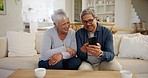 Happy senior couple, sofa and phone to scroll social media, reading digital news article and funny multimedia at home. Elderly man, woman and laugh for mobile app, meme and smartphone subscription 