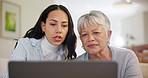 Woman, senior mom and learning with laptop glitch, error and mistake with typing, software and notification. Computer, mother and daughter with helping, teaching and click for email on sofa in home