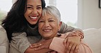 Happy, hug and face of woman with senior mother on sofa for bonding together in the living room. Smile, love and portrait of young female person embracing her elderly mom in retirement at modern home