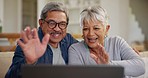 Senior, couple and video call on laptop with wave, hello or greeting with happiness on sofa in living room. Elderly, man and woman with smile on computer for communication, networking or conversation