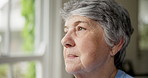 Senior woman, anxiety and thinking on retirement, stress and worry by window for future. Elderly female person, depression and nervous for nursing home, fear and doubt or regret for choice in closeup