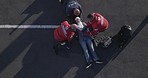 Emergency, road accident and people on stretcher for disaster, injury and car crash for saving patient. Paramedic, ambulance and healthcare emt with person for medical service, care and first aid