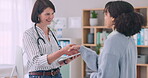 Healthcare, tablet and doctor shaking hands with a woman in the office of a hospital for medical agreement. Handshake, welcome or thank you with a medicine professional meeting a patient in a clinic