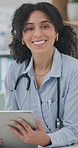 Doctor, woman and face with tablet in clinic office for report, telehealth and smile at desk. African medic, digital touchscreen and portrait to check email notification, happy and online consulting