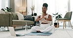 Home, yoga and meditation with black woman, laptop or fitness with wellness, pilates or chakra. African person, yogi or healthy girl with peace, lotus or calm with training, apartment or online class