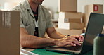 Businessman, laptop and typing with box in logistics, supply chain or inventory management at warehouse. Closeup of man hands working on computer in small business for shipping, ecommerce or orders