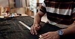 Fashion, designer and hands of man with ruler, fabric and textile pattern at small business in creativity. Design, production or manufacturing of luxury clothes with tailor in workshop planning art