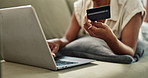 Credit card, hands or woman in home with laptop for payment on ecommerce website for investment. Typing, financial or closeup of customer online shopping with password on internet or fintech on sofa