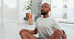 Calm man, yoga and relax in meditation, zen or spiritual wellness for mental health at home. Male person or yogi meditating in fitness, pilates or peace for mindset, awareness or stress relief