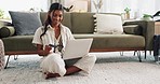 Happy woman, laptop and credit card on floor for payment, online shopping or transaction in living room at home. Female person or shopper smile on computer with debit in purchase, buying or ecommerce