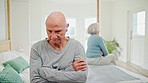 Senior couple, breakup and fight on bed in conflict, disagreement or dispute at home. Frustrated elderly man in cheating affair, divorce or disappointment in bedroom argument or toxic relationship