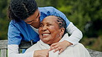 Senior care, old woman and nurse on bench in garden with blanket, smile and support in retirement. Kindness, elderly person and happy caregiver in park, nursing home backyard and healthcare in nature