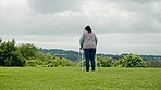 Walking frame, garden and elderly woman in nature for fresh air, wellness and exercise in retirement. Outdoors, grass and senior person with disability for health, support and mobility in backyard