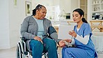 Document, healthcare and nurse with patient in wheelchair in living room for medical consultation. Paperwork, discussion and female caregiver with mature elderly woman with disability at nursing home