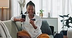 Home, credit card and black woman on a couch, smartphone and connection with payment, online shopping and smile. African person, apartment or girl on sofa, cellphone or transaction with investment