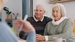 Hospital, healthcare and doctor talk with senior couple and caregiver with checklist for health. Homecare, conversation and patient with insurance and medic planning in retirement with consultation