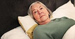 Senior, woman and awake for lying in bed after sleep, dream or rest in home. Elderly person, grandmother or retirement for peace, calm and alone for comfort, wellness or health for self care to relax