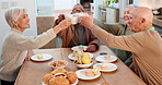 Tea party, elderly friends and toast with people in a retirement home together for bonding in the morning. Smile, cheers and group of happy seniors in the living room of an apartment for celebration