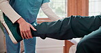 Physical therapy, senior man and leg stretch with hand and wellness exercise for health at hospital. Physiotherapist, healing and elderly patient with consultation and assessment for care and support