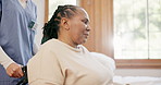 Nurse, senior black woman and push wheelchair with support, care and recovery from injury in hospital. Caregiver, physiotherapist and African person with disability in rehabilitation with healthcare