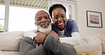 Smile, face and nurse hugging a patient on a sofa for relaxing and resting in living room at home. Happy, comfort and portrait of African female caregiver embrace senior black man in lounge at house.