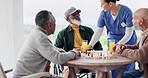 Caregiver, man and juice for health home with friends for visit, chessboard and game in garden. Elderly people, patient and together for bonding, activity or challenge with organic, fresh and drink