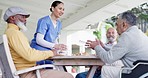 Happy woman, nurse and breakfast with coffee in elderly care for meal, snack or beverage at retirement home. Female person, doctor or medical caregiver serving drinks to senior group at nursing house