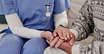 Senior, hand and nurse with holding hands for empathy, care and kindness for healthcare or retirement on sofa of home. Elderly, people and caregiver with comfort, sympathy and support on couch