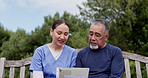 Happy woman, nurse and senior patient on park bench with documents for life insurance in nature. Female person or medical doctor sitting, outdoor or talking to mature man with paperwork in healthcare