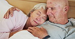 Senior, couple and sleep in bed hug for morning connection or love retirement, relax or peace. Elderly man, woman and eyes closed for calm dream in home for cozy marriage, tired rest or together care