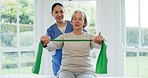 Nurse, elderly woman and physiotherapy with resistance band for arm muscle exercise in home. Physical therapy, caregiver or stretching for fitness, rehabilitation or body health, training or recovery