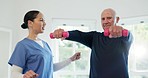 Dumbbells, fitness or training with a nurse and old man in a retirement home for physiotherapy or rehabilitation. Exercise, health or recovery with a woman caregiver and senior patient in a house