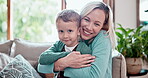 Mother, son and smile in portrait, hug and bonding on couch, love and support or connection. Happy family, motherhood and embrace or care, security and relax on mothers day, face and affection