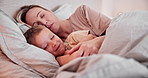 Home, bed and mother with boy, sleeping and family with love, peace and security with trust. Apartment, relax and child embrace, parent or freedom with rest, weekend and comfort with care and blanket