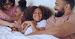 Parents, children or tickle in bed in communication, wellness or laughter in morning for love together. Mom, dad or kids in brazil in conversation, funny in bedroom or happy family to play in bonding