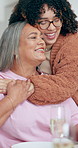 Woman, hug senior mom and dinner in family home with love, bonding or care with funny conversation. Girl, elderly mother and embrace for chat, talking or remember comic memory in house for crazy joke