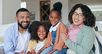 Parents, children and face smile on sofa or daughter development, home support or happy connection. Mother, father and girls portrait on holiday vacation relax as family weekend, love or safety trust