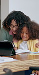 Mother, child and tablet with homework book, hug and support for learning, development and study. Mom, kid and reading together with embrace, progress or writing notes for online class in family home
