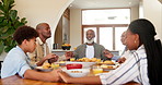 Black family, praying and dinner in home, holding hands and support with gratitude, faith and religion. Men, women and kids with care, love and food in house for connection, thanksgiving or brunch