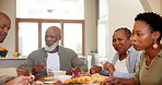 Food, black family and children at table for lunch, supper and eating meal at home together. Grandparents, parents and kids for bonding, relax and talking in dining room for happy relationship