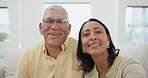 Selfie, love and smile with an elderly couple on a sofa in the living room of their home together for bonding. Portrait, relax or romance with a senior man and woman in their apartment for retirement