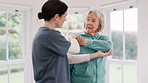 Woman, doctor and senior patient stretching in physiotherapy, fitness or exercise at old age home. Female person, therapist or nurse in body warm up, arm stretch or muscle for therapy care at house