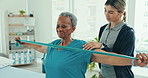 Physical therapy, senior woman and resistance band health consultation and wellness in clinic. Working, rehabilitation and hospital with caregiver and healthcare worker with physiotherapy and patient