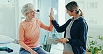 Physical assessment, senior woman and high five from health consultation and success in clinic. Working, rehabilitation and hospital with caregiver and healthcare worker with physiotherapy and smile